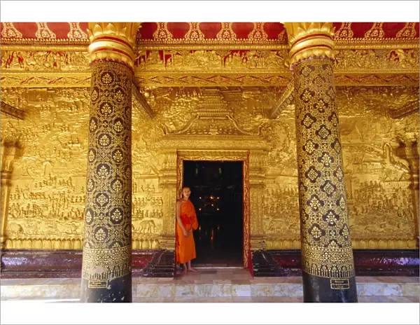 Exterior gilded relief on Wat Mai Suwannaphumaham