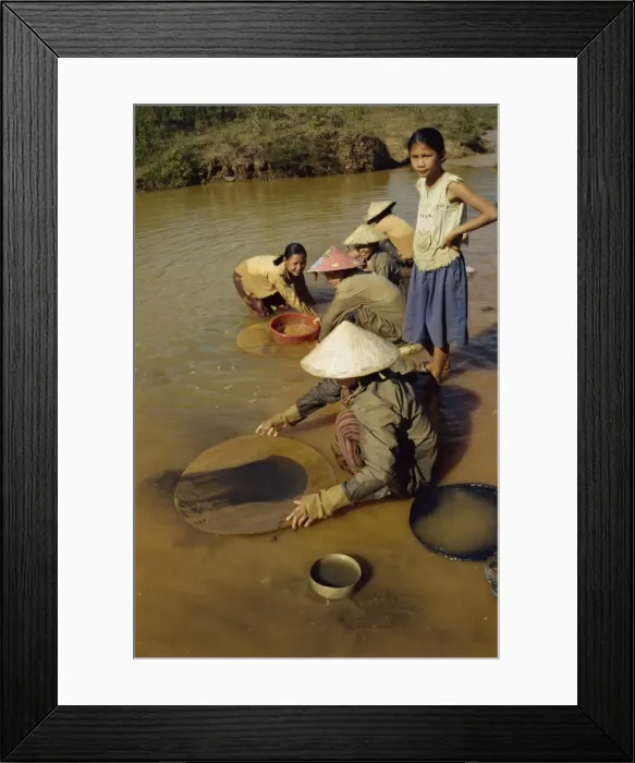 Framed Print : Women panning for black tin oxide