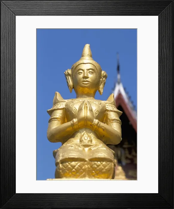 Framed Print : Kneeling Buddha statue