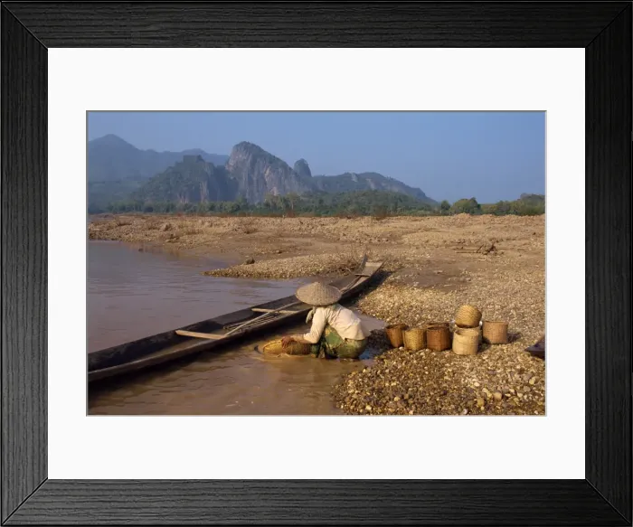 Framed Print : Woman panning for gold in the Mekong River Framed Print : Woman panning for gold in the Mekong River