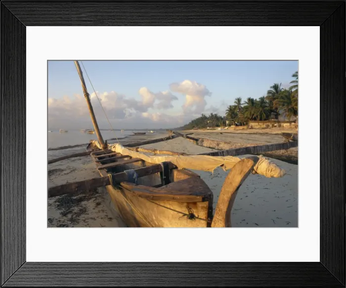 Framed Print : Canoe pulled up onto beach at dusk Framed Print : Canoe pulled up onto beach at dusk