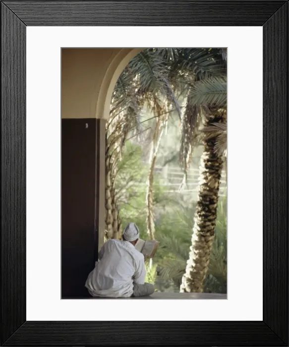 Framed Print : Man reading Koran in mosque Framed Print : Man reading Koran in mosque
