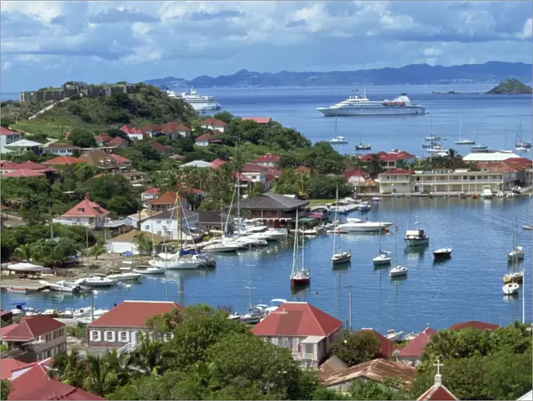Aerial view over Gustavia, with cruise ship anchored offshore, St