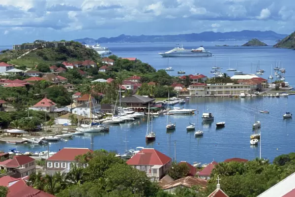 Aerial view over Gustavia, with cruise ship anchored offshore, St