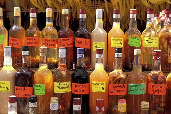 Bottles of local rum drinks at Le Diamant village