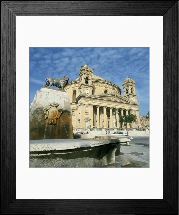 Framed Print : Lion on a fountain in front of the Rotunda church at Mosta Framed Print : Lion on a fountain in front of the Rotunda church at Mosta