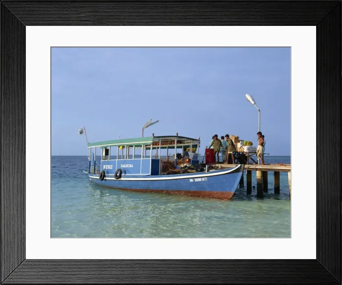 Framed Print : Rubbish collection by Dhomi on the island of Nakatchafushi