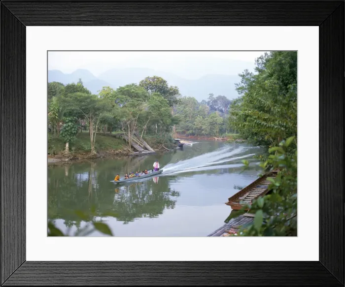Framed Print : Outboard powered longboat on the Melinau River Framed Print : Outboard powered longboat on the Melinau River