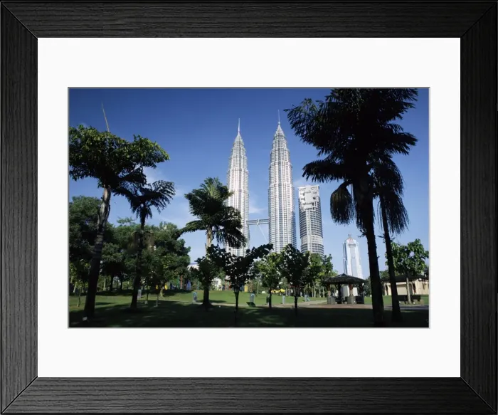 Framed Print : Petronas twin towers seen from public park