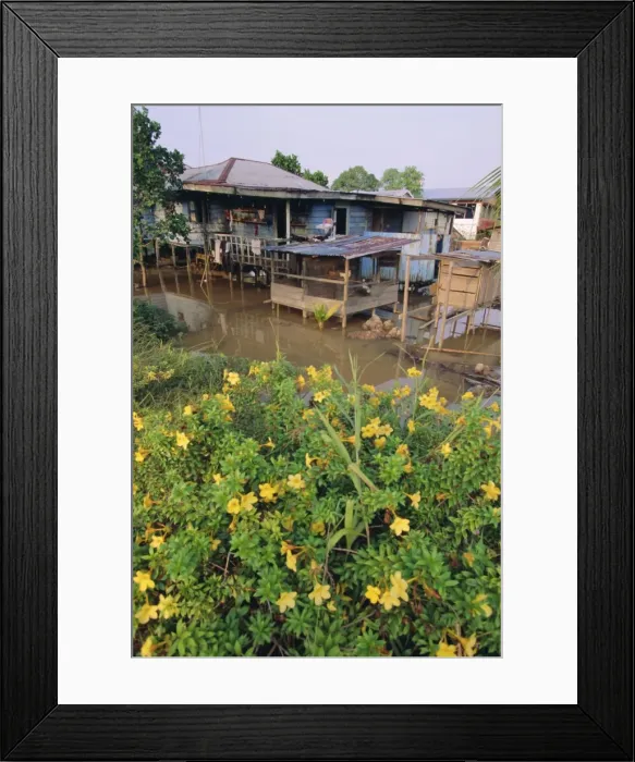 Framed Print : Stilt houses on the Rejang River Framed Print : Stilt houses on the Rejang River