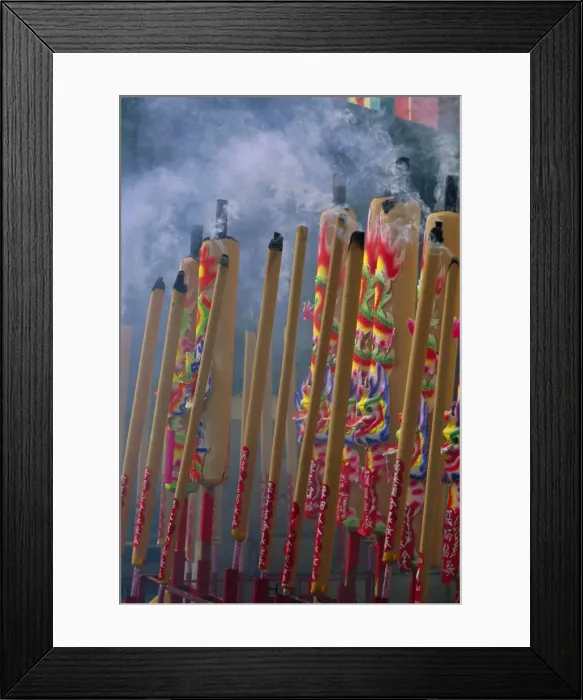 Framed Print : Burning incense on religious holiday