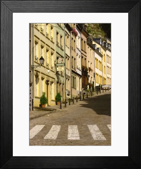 Framed Print : Street scene of cafe and houses in the valley village of Grund Framed Print : Street scene of cafe and houses in the valley village of Grund