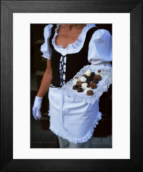 Framed Print : Waitress carrying tray of chocolate Framed Print : Waitress carrying tray of chocolate