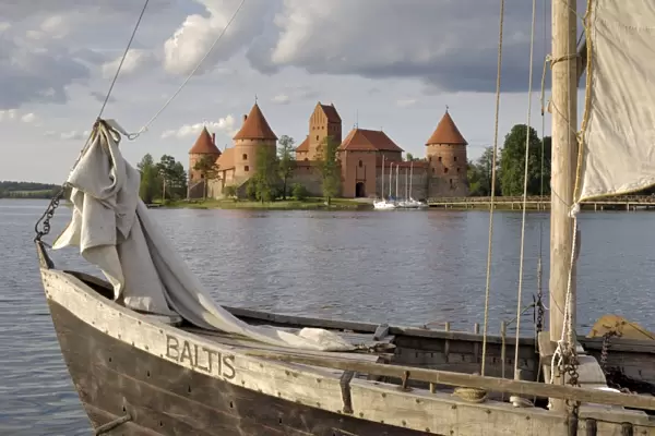 Traditional boat and Trakai Castle