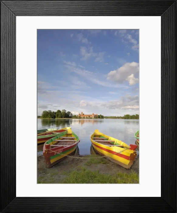 Framed Print : Colourful rowing boats and Trakai Castle Framed Print : Colourful rowing boats and Trakai Castle