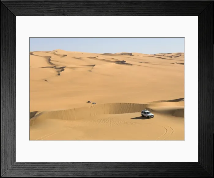Framed Print : SUV on sand dunes Framed Print : SUV on sand dunes