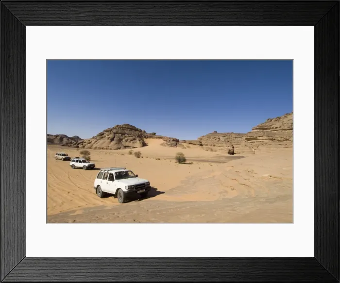 Framed Print : SUV climbing rock Framed Print : SUV climbing rock