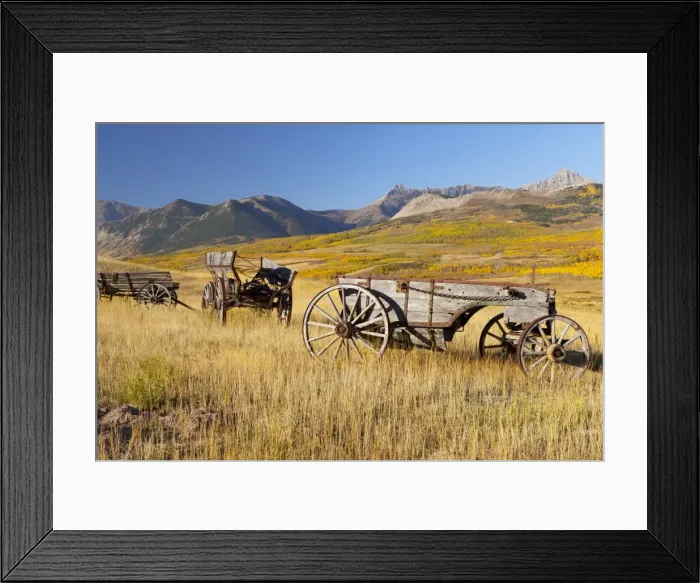 Framed Print : Old horse-drawn wagons with the Rocky Mountains in the Background, near Waterton Framed Print : Old horse-drawn wagons with the Rocky Mountains in the Background, near Waterton