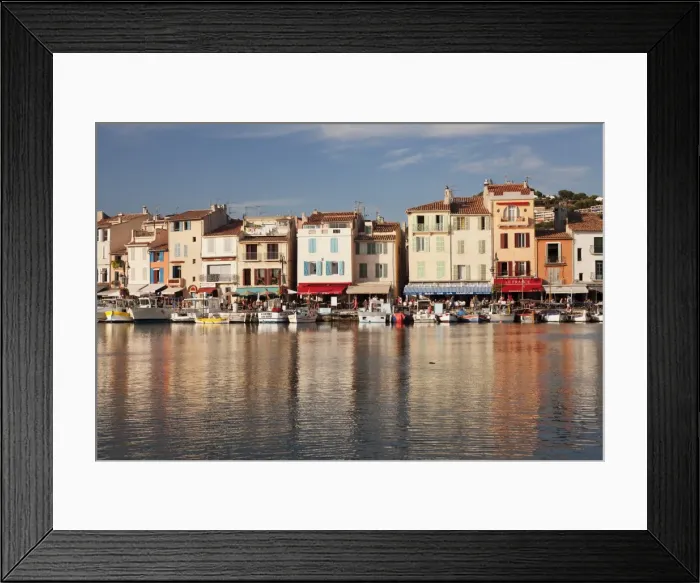 Framed Print : Fishing boats at the harbour, restaurants and street cafes on the promenade, Cassis Framed Print : Fishing boats at the harbour, restaurants and street cafes on the promenade, Cassis