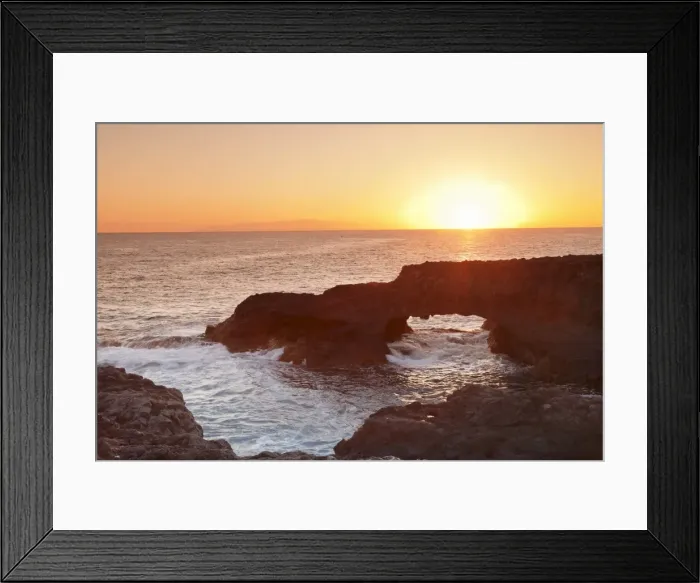 Framed Print : Rock arch at sunrise, Charco Manso Bay, Punta Norte near Echedo, UNESCO biosphere reserve Framed Print : Rock arch at sunrise, Charco Manso Bay, Punta Norte near Echedo, UNESCO biosphere reserve
