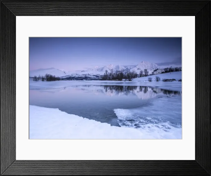 Framed Print : Snowy peaks are reflected in the frozen Lake Jaegervatnet at dusk, Stortind, Lyngen Alps Framed Print : Snowy peaks are reflected in the frozen Lake Jaegervatnet at dusk, Stortind, Lyngen Alps