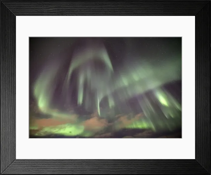 Framed Print : The shapes of green light of the Aurora Borealis color the sky, Lyngen Alps, Troms