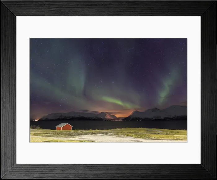 Framed Print : Northern Lights illuminates the wooden cabin at Svensby, Lyngen Alps, Troms, Lapland Framed Print : Northern Lights illuminates the wooden cabin at Svensby, Lyngen Alps, Troms, Lapland