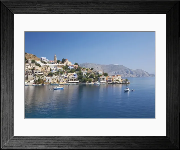 Framed Print : View across the tranquil waters of Harani Bay, Gialos (Yialos), Symi (Simi), Rhodes Framed Print : View across the tranquil waters of Harani Bay, Gialos (Yialos), Symi (Simi), Rhodes