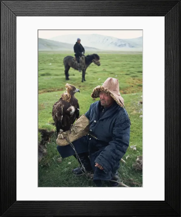 Framed Print : Portrait of an eagle breeder in traditional clothing Framed Print : Portrait of an eagle breeder in traditional clothing