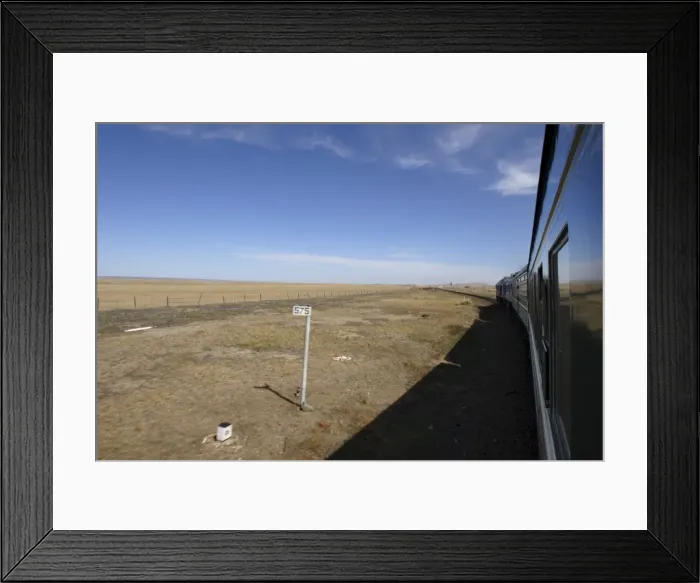 Framed Print : Trans-Mongolian train travelling through the Gobi desert Framed Print : Trans-Mongolian train travelling through the Gobi desert