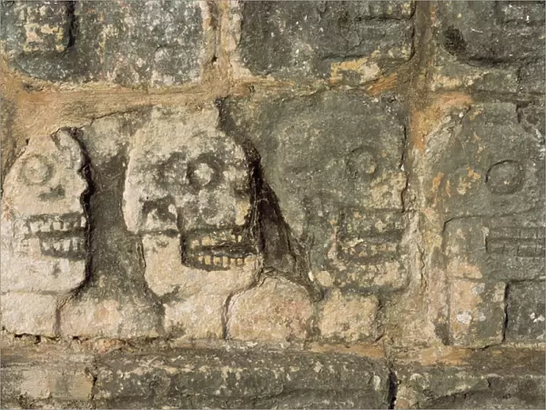 Carvings of skulls on the Tzompantli