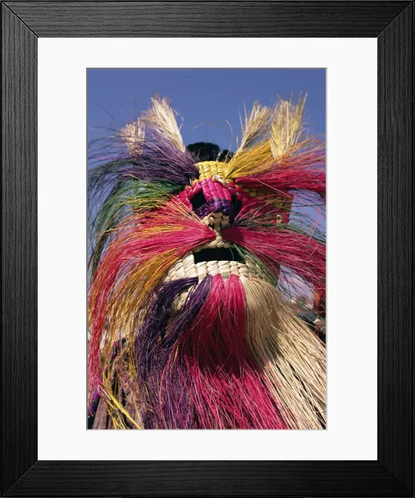 Framed Print : Head and shoulders portrait of a person wearing a brightly Framed Print : Head and shoulders portrait of a person wearing a brightly