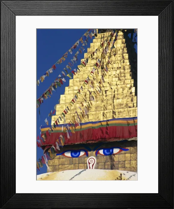 Framed Print : Buddhas eyes on gold leaf spire of one of the world s Framed Print : Buddhas eyes on gold leaf spire of one of the world s
