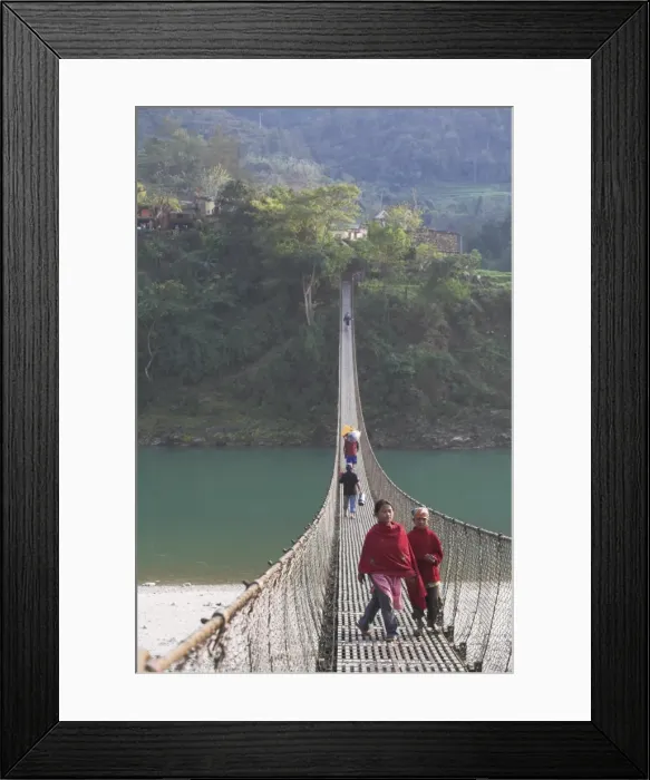 Framed Print : Local people crossing the 160m long suspension bridge Framed Print : Local people crossing the 160m long suspension bridge