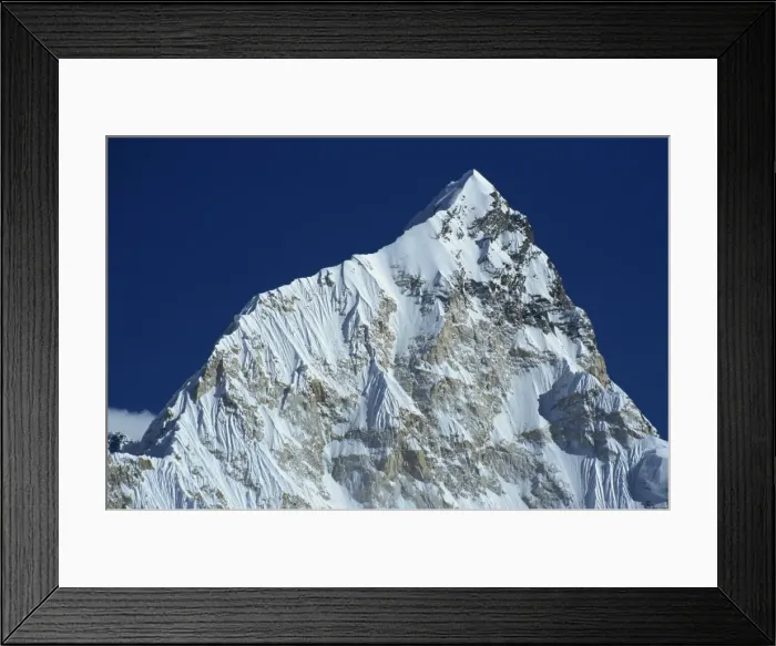 Framed Print : The snow covered Nuptse peak seen from Kala Patar in the Himalayas Framed Print : The snow covered Nuptse peak seen from Kala Patar in the Himalayas