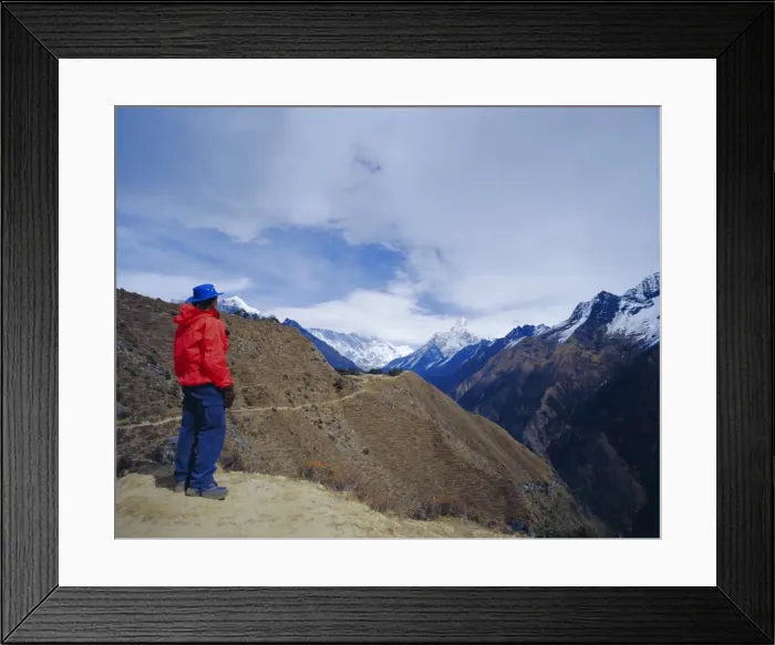 Framed Print : Trekker looking at Ama Dablan and other mountains of the Himalayas Framed Print : Trekker looking at Ama Dablan and other mountains of the Himalayas
