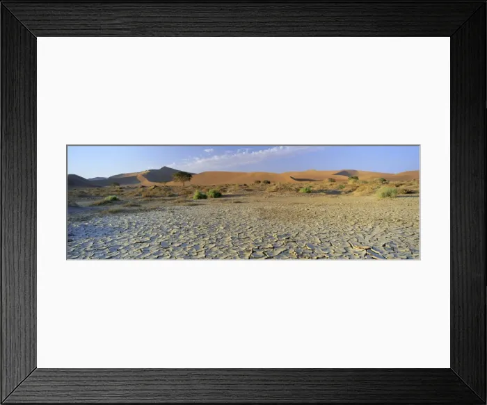 Framed Print : Panoramic view of sun-baked pan of cracked mud near Sossusvlei Framed Print : Panoramic view of sun-baked pan of cracked mud near Sossusvlei
