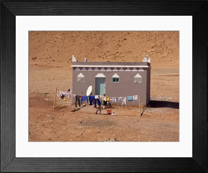 Framed Print : Traditional house with satellite dish outside Framed Print : Traditional house with satellite dish outside