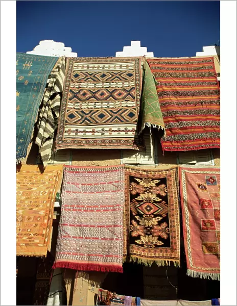 Carpets for sale outside shop in frontier town of Agdz