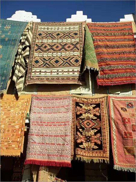 Carpets for sale outside shop in frontier town of Agdz