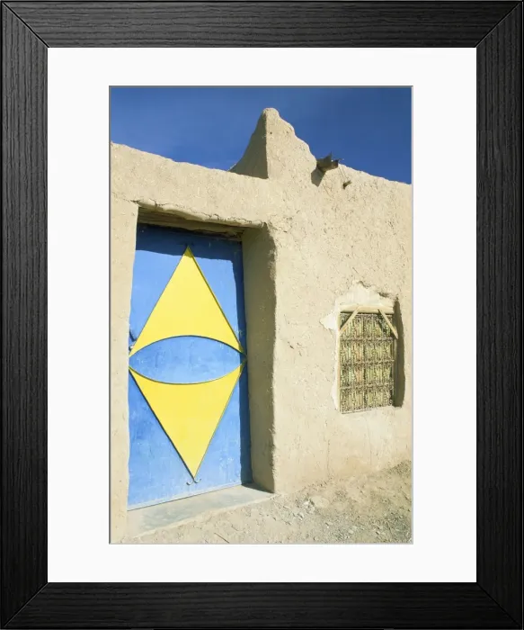 Framed Print : Mud house with colourful door Framed Print : Mud house with colourful door