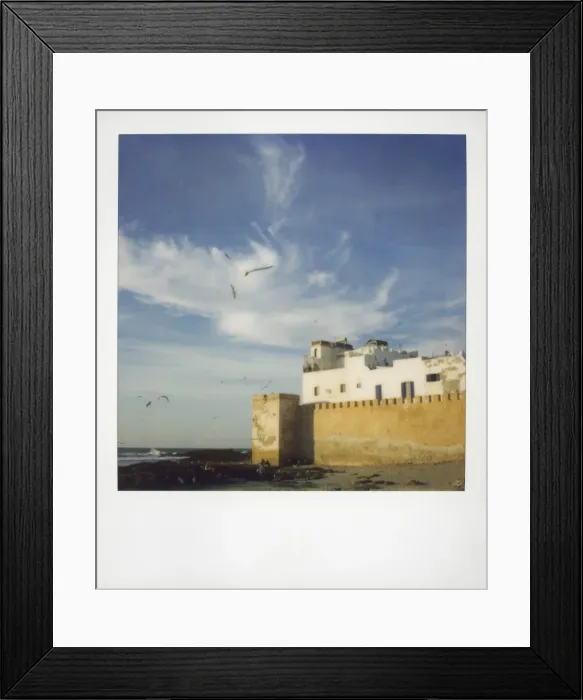 Framed Print : Polaroid image of old ramparts and whitewashed building Framed Print : Polaroid image of old ramparts and whitewashed building