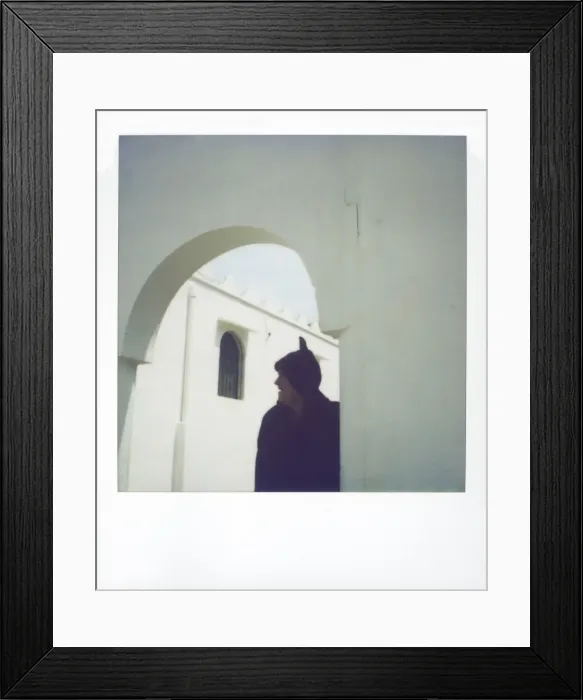 Framed Print : Polaroid image of man wearing traditional woolen djellaba Framed Print : Polaroid image of man wearing traditional woolen djellaba