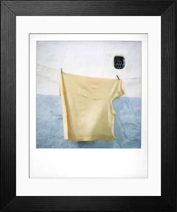 Framed Print : Polaroid image of blanket drying in the sun against Framed Print : Polaroid image of blanket drying in the sun against