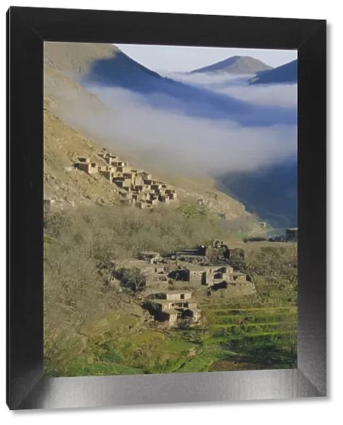 Mist rising above a village in the High Atlas mountains