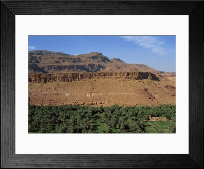 Framed Print : Trees and fields below arid mountains Framed Print : Trees and fields below arid mountains