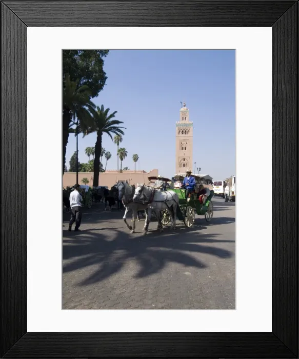 Framed Print : Horse and carriage near Jemaa el Fna with Koutoubia in background