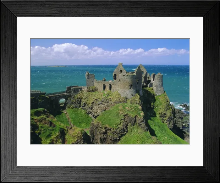 Framed Print : Dunluce Castle on rocky coastline Framed Print : Dunluce Castle on rocky coastline