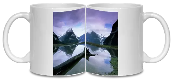 Reflections and view across Milford Sound to Mitre Peak
