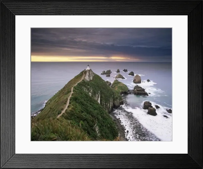 Framed Print : Nugget Point lighthouse on the coast and overcast sky Framed Print : Nugget Point lighthouse on the coast and overcast sky